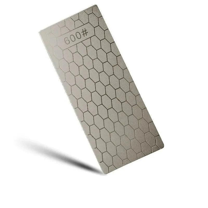 Diamond grinding plate with hexagonal pattern, marked with 600# grit.