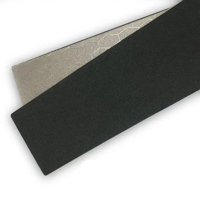 Double-sided diamond grinding plate featuring hexagonal pattern and black backing.