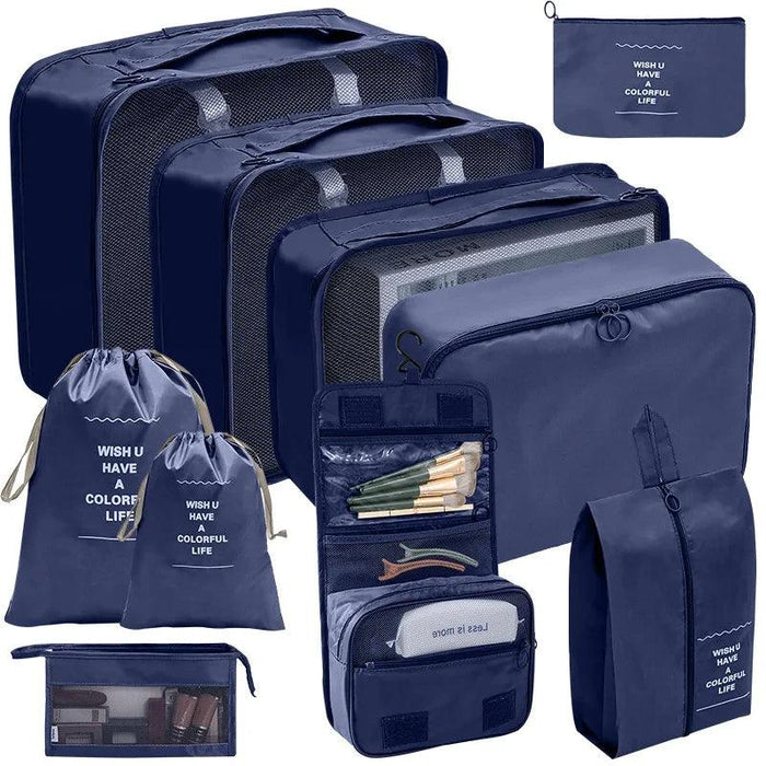 Navy blue travel organizer set featuring three mesh packing cubes, a drawstring bag, a toiletry bag, a small pouch and a few more bags, all coordinated with the inspirational message 'WISH U HAVE A COLORFUL LIFE'. Ideal for systematic packing and organization. Display on white background.