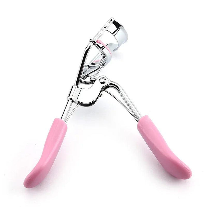 Silver Eyelash Curler With Pink Handles, shown from the side.