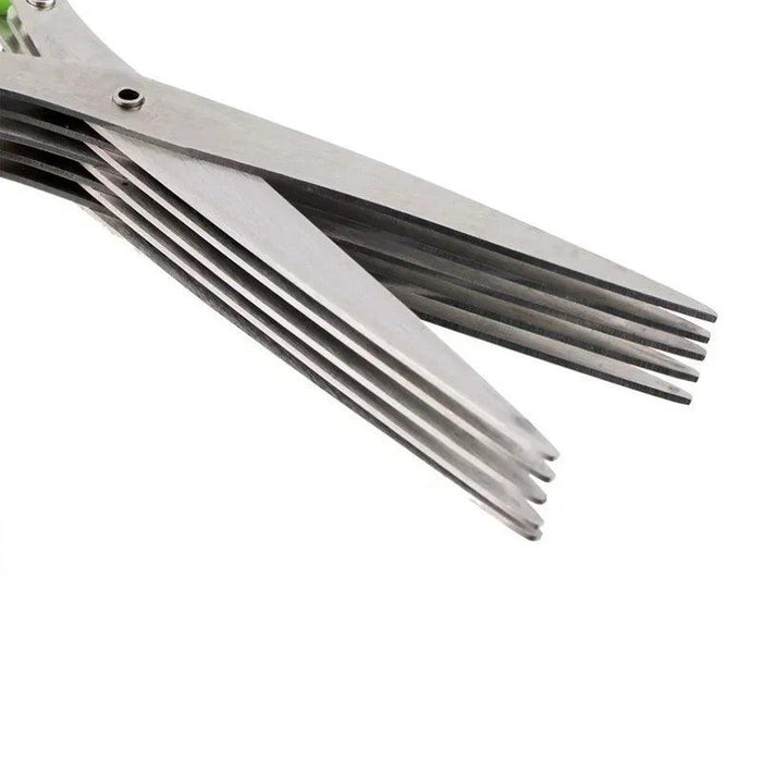 Close-up of green-handled herb scissors with five stainless steel blades.