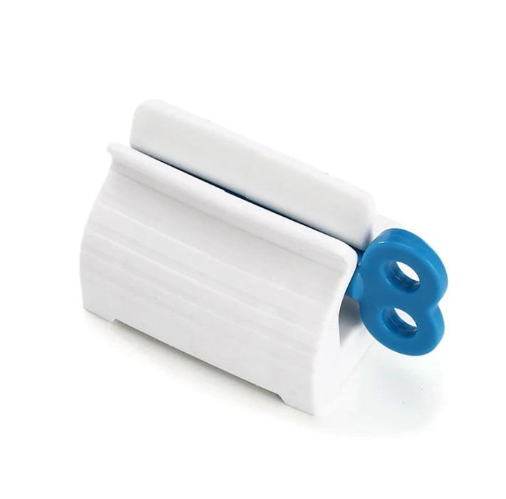 white toothpaste squeezer with a Blue key.