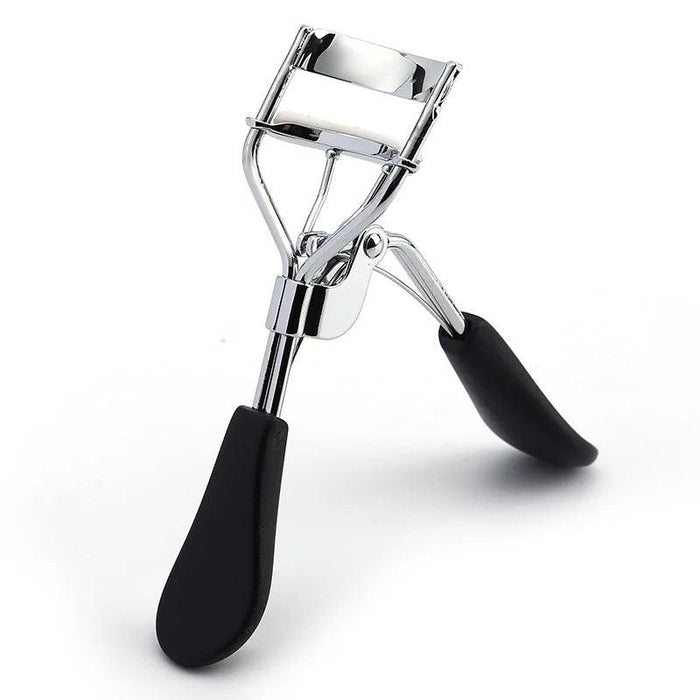 Silver Eyelash Curler With Black Handles.