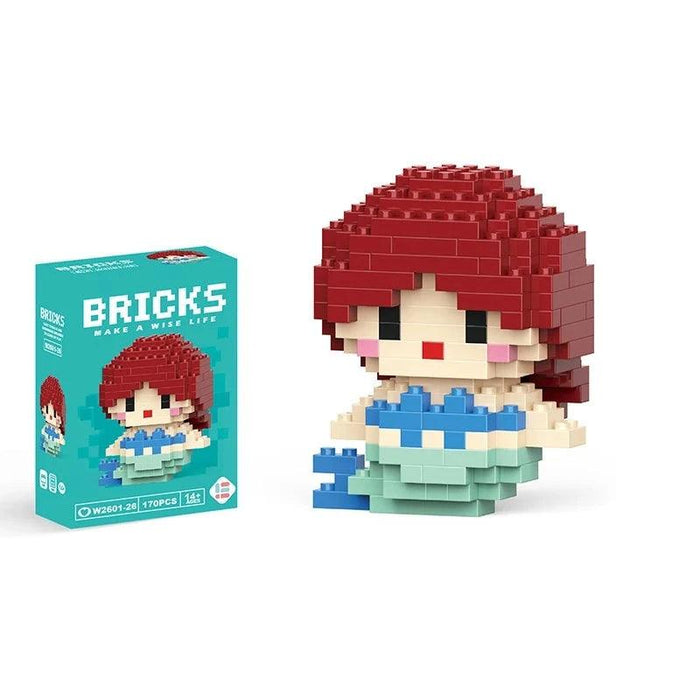 A single block-style toy figure of mermaid, along with its blue packaging box. Display on white background.