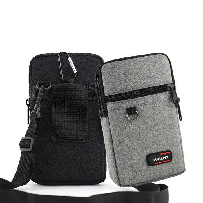 Two small pouches side by side, one black and one gray. The black pouch's back side is shown, featuring a webbed strap and a carabiner clip for attaching to belts or bags. The gray pouch's front side is shown with a zipper pocket, a D-ring, and a small logo label.