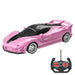 A sleek, pink sports car with black accents and an accompanying remote control.