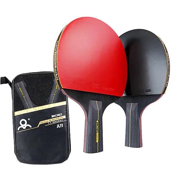 Two table tennis paddles, one with a red rubber surface and the other with a black rubber surface, along with a black carrying case. It has short handles.