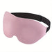 Pink sleeping mask with black strap.