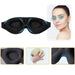 Black contoured sleep mask with blue highlights and a model showing its fit over the eyes.