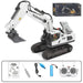 White and grey toy excavator with remote control and accessories.