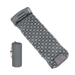 A gray inflatable sleeping mat with a hexagonal pattern, along with a matching gray carrying bag.